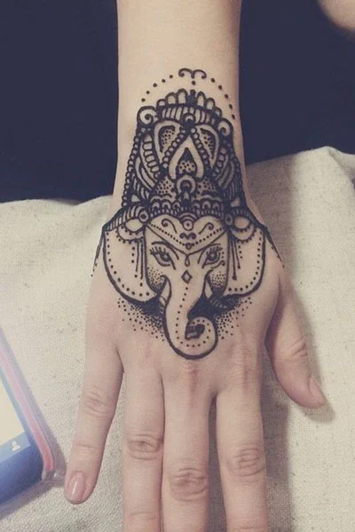 Elephant tattoo on the wrist