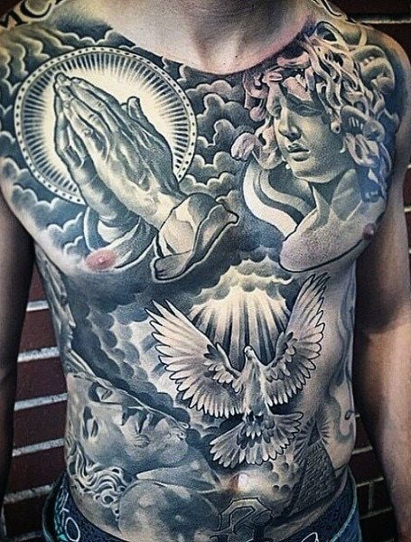 Religious tattoo on the whole belly