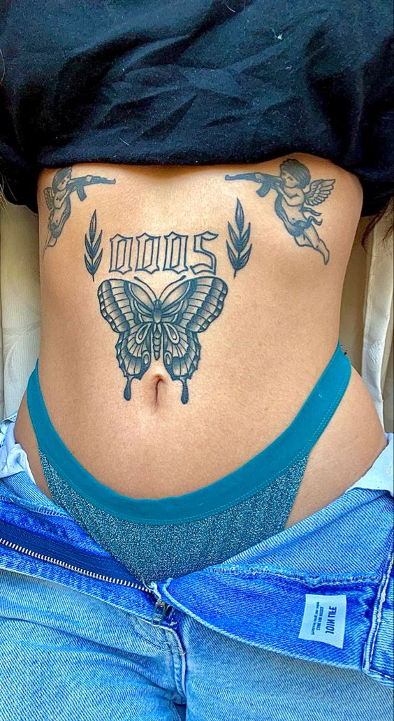 Butterfly tattoo on the stomach