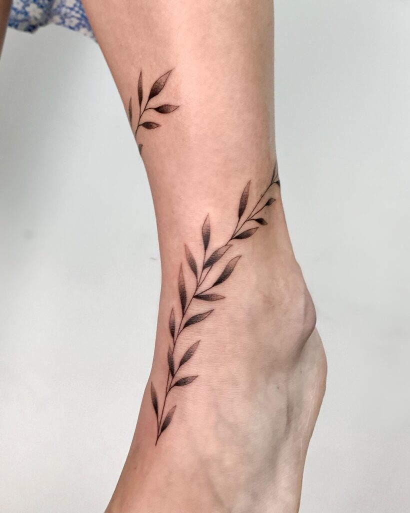 Tattoo of a leaf on the ankle