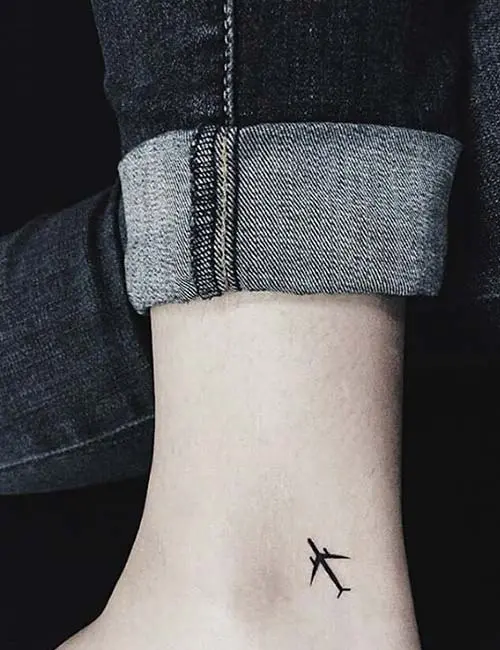 Airplane tattoo on the ankle