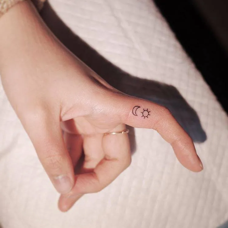 Women's finger tattoos