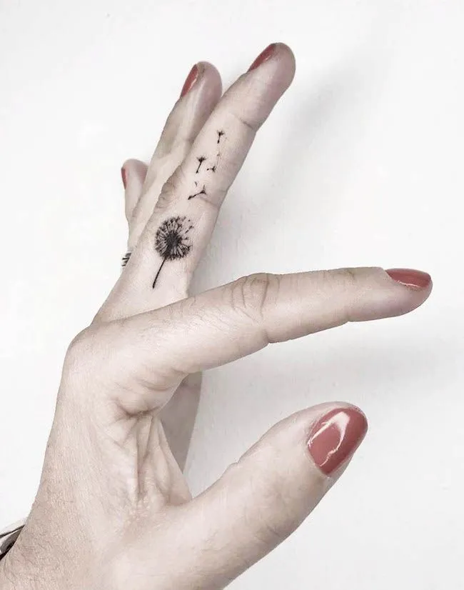 Women's finger tattoos