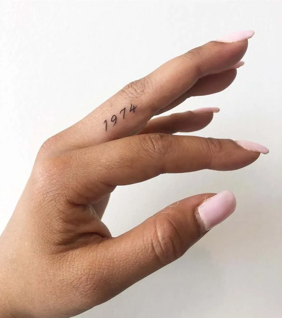 Small tattoos on the fingers