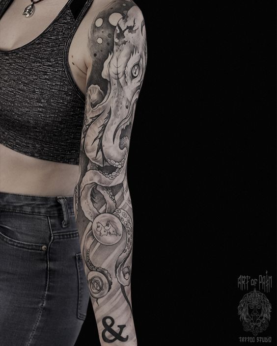 Tattoo of a snake in roses in a graphic style on the forearm