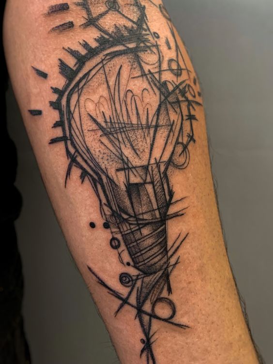 Graphic style tattoo on the forearm