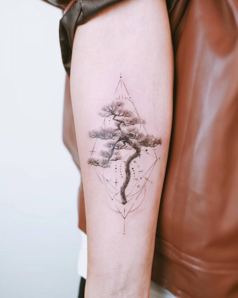 Tattoo on the arm in a graphic style