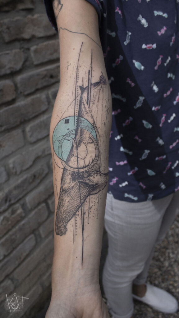 Tattoo on the forearm in graphic style