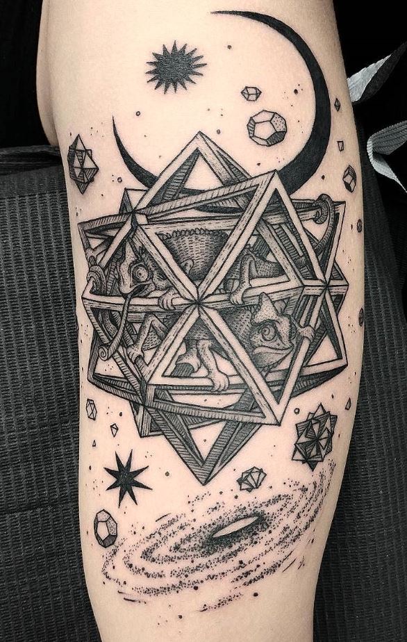 black and gray tattoo on the arm