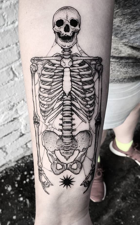 Skeleton tattoo on the arm for men