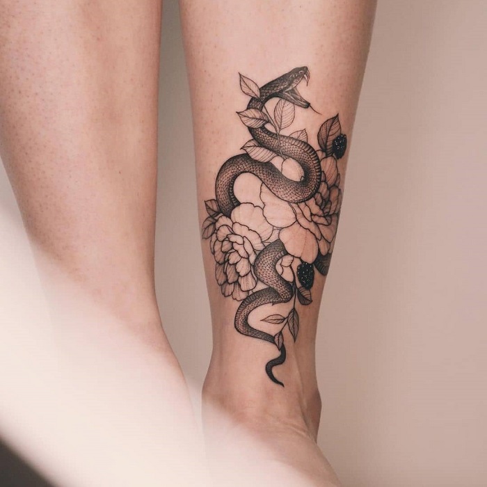 Snake tattoo on the shin