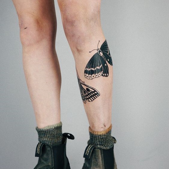 Butterfly tattoo on the shin