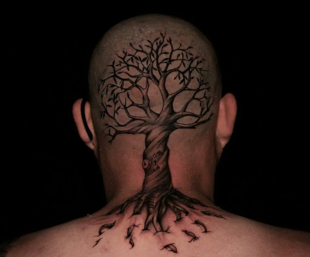 A tree tattoo on the back of your head