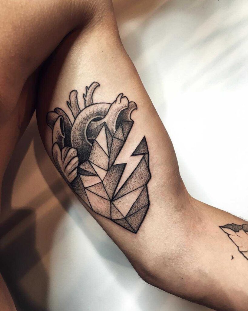 Heart tattoo on biceps