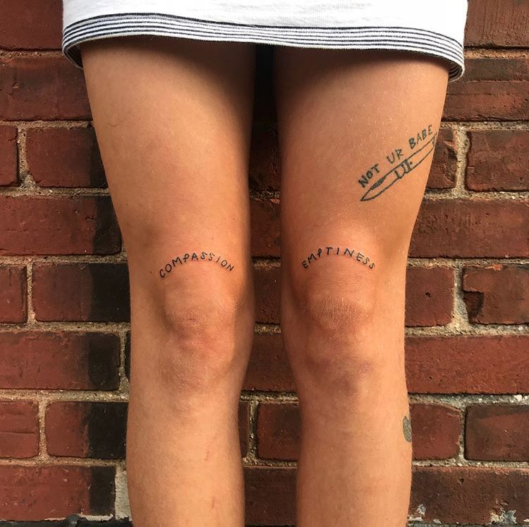 Tattoo inscriptions on knees