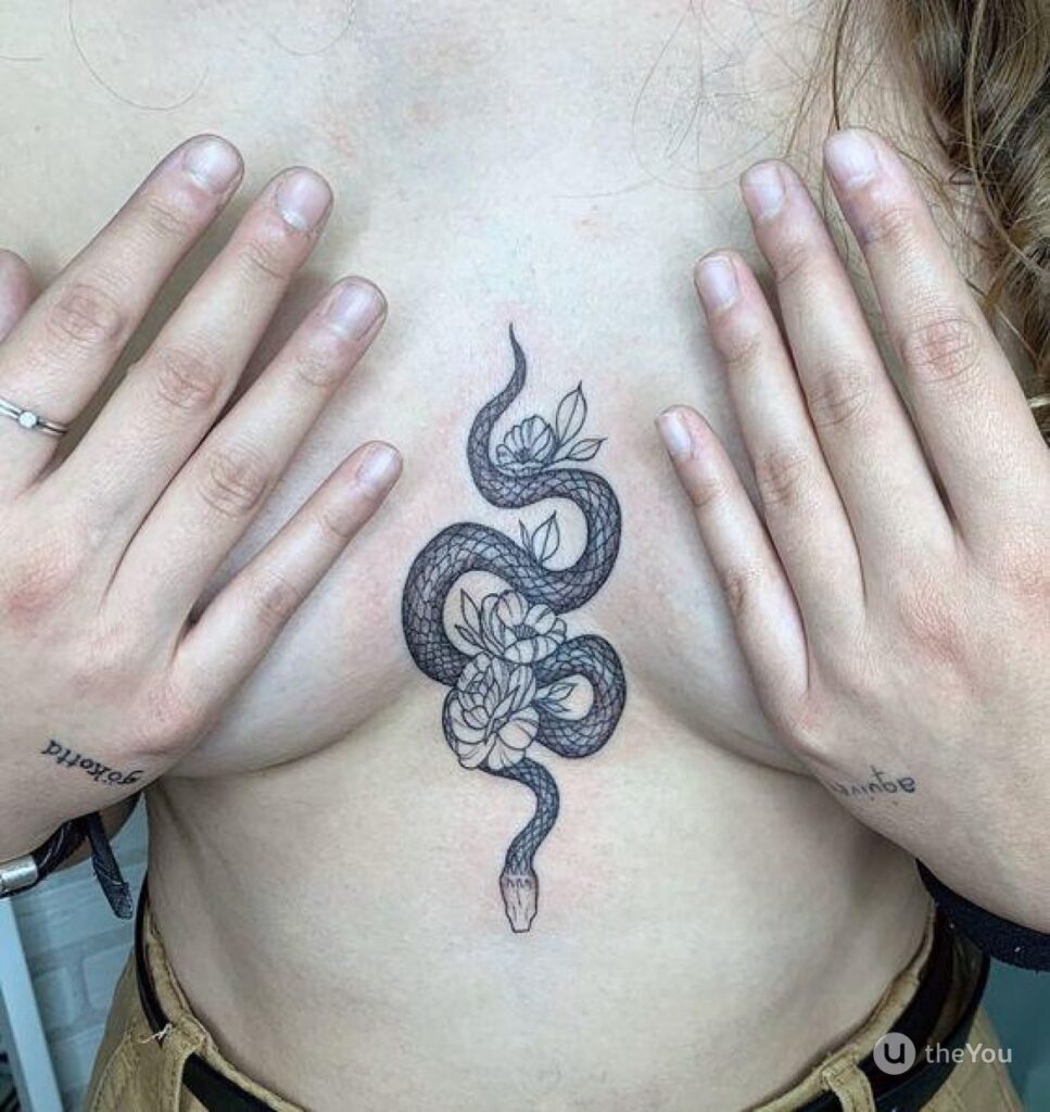 Intimate snake tattoos on breasts