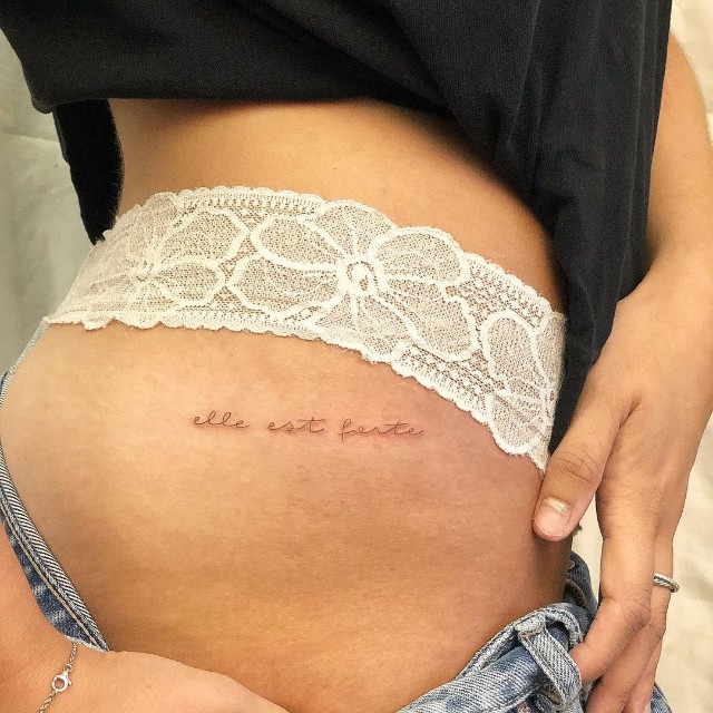 Tattoo Short Quotation on Thigh