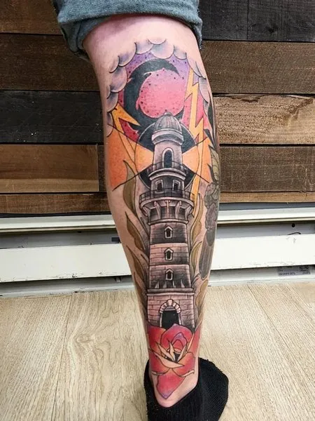 Lighthouse tattoo on leg