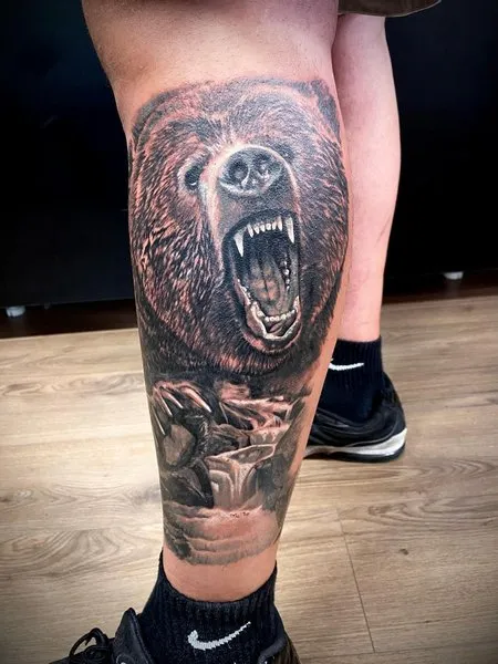 Tattoo of a bear on your foot