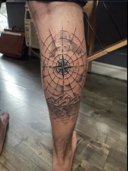 Tattoo a compass on the leg