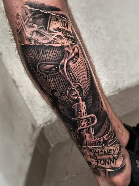 Gangster tattoo on the leg