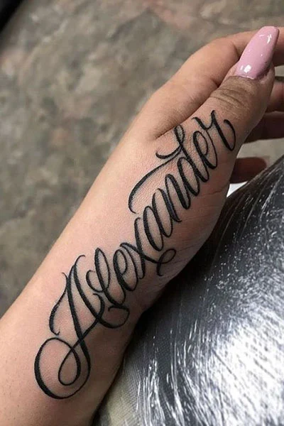 A tattoo with a name on the arm