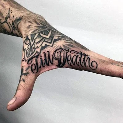 A tattoo with a name on the arm