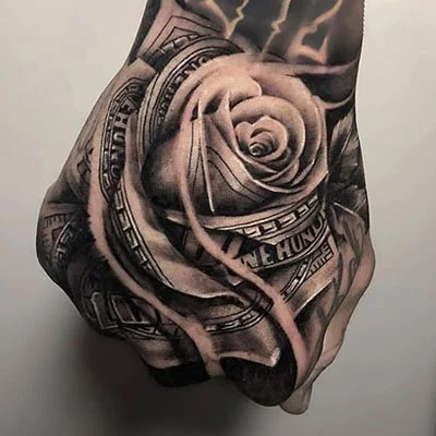 Tattoo of a rose on the hand