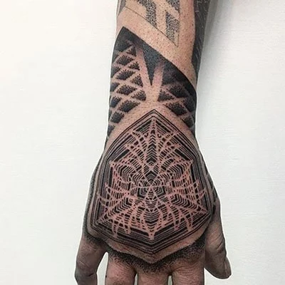 Tribal hand tattoo