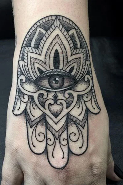 Hamsa tattoo on wrist