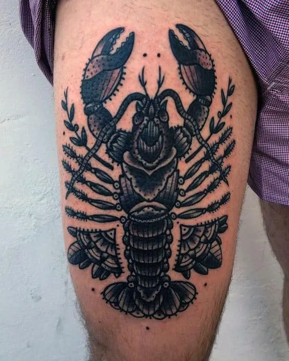 Scorpion tattoo on the thigh