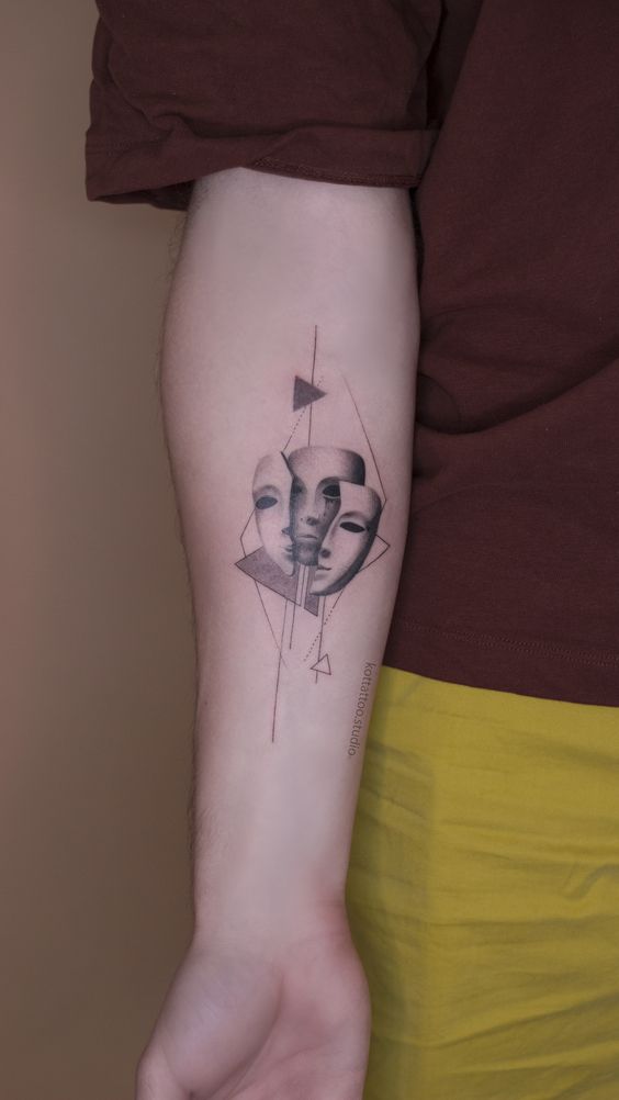 Graphic style tattoo on the forearm