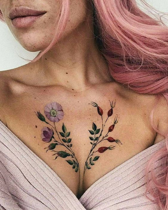 Tattoos of flowers above the chest