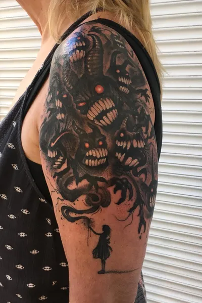 Tattoo on the shoulder in a fantasy style