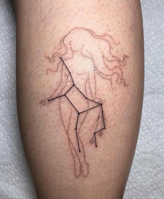 Tattoo constellation sign of the zodiac Virgo on the leg