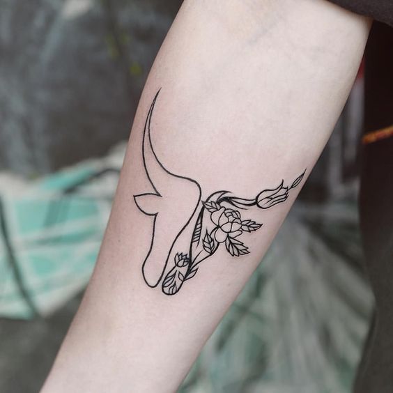 Capricorn tattoo in minimalist style