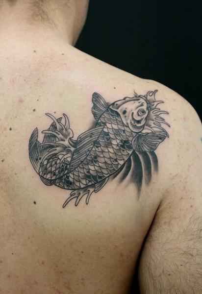 Carp tattoo on the shoulder blade