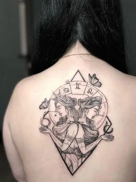 Tattoo of the zodiac sign Gemini on the back