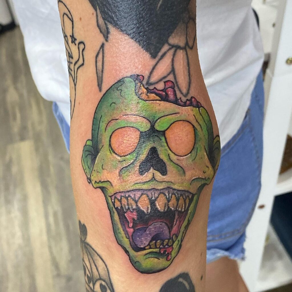 Skull tattoo on the elbow