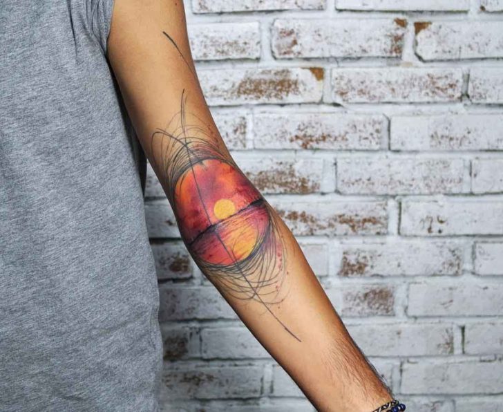 Sunset tattoo on inner side of elbow