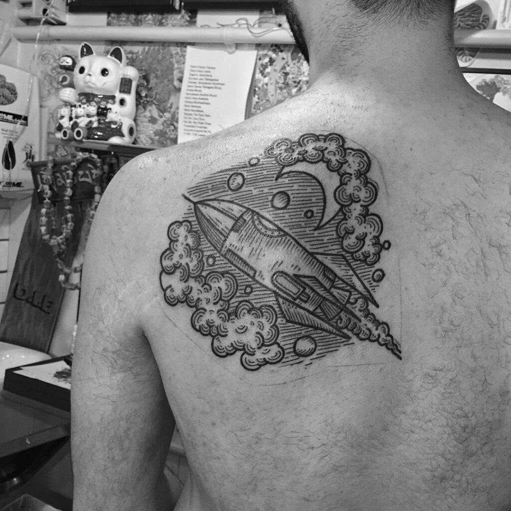 Rocket tattoos on the shoulder