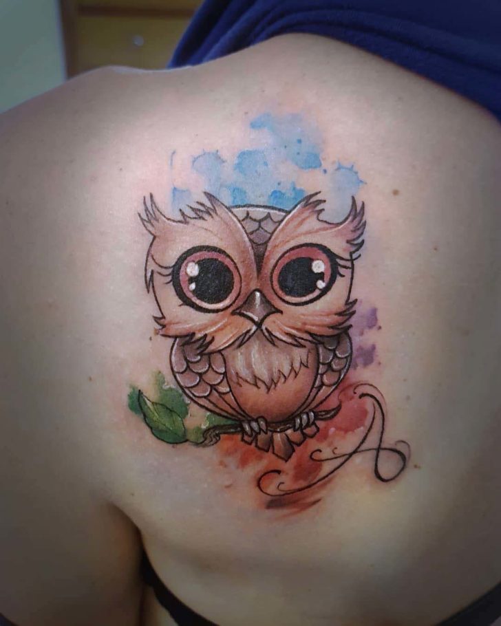 Cute owl tattoo on the shoulder blade