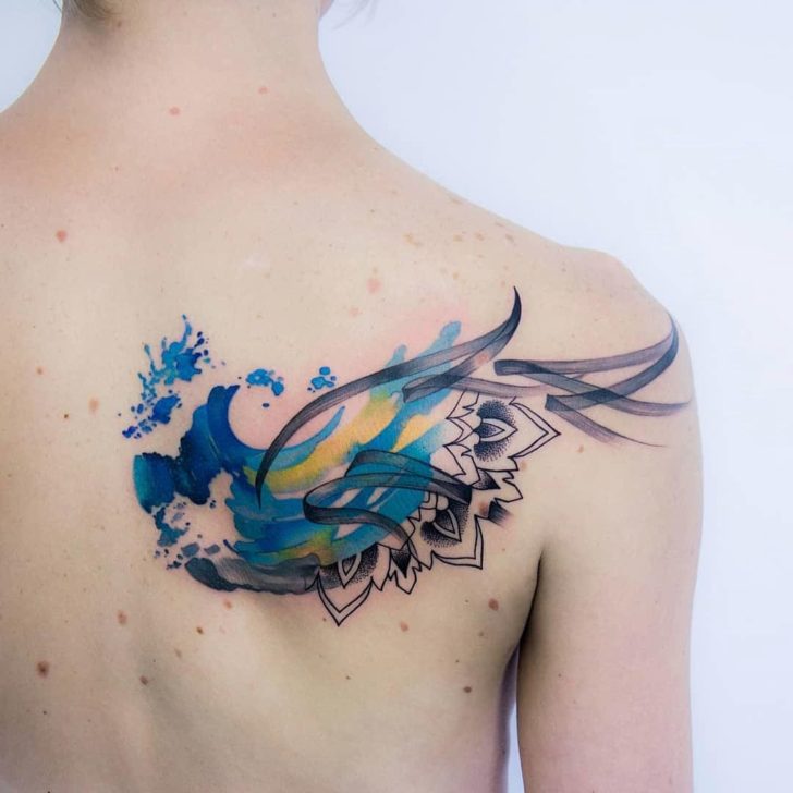 Abstract mandala tattoo on the scapula