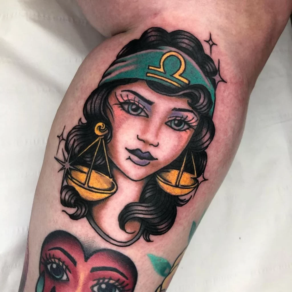 Tattoo of a girl and the zodiac sign of Libra