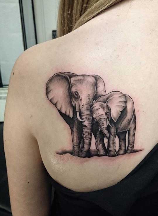 Elephant tattoo on shoulder blade