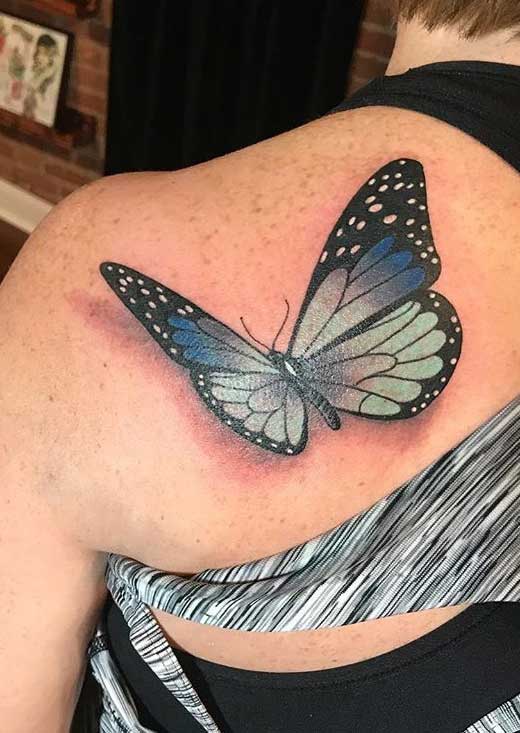 Butterflies tattoo on the scapula