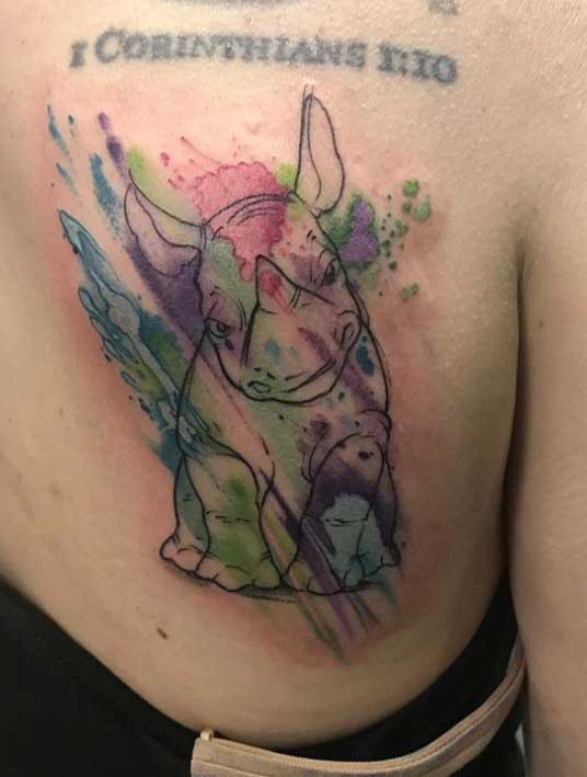 Animal tattoos on the scapula