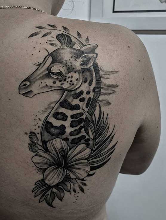 Animal tattoos on the scapula