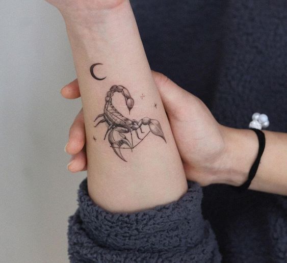 Tattoo of a scorpion on your arm