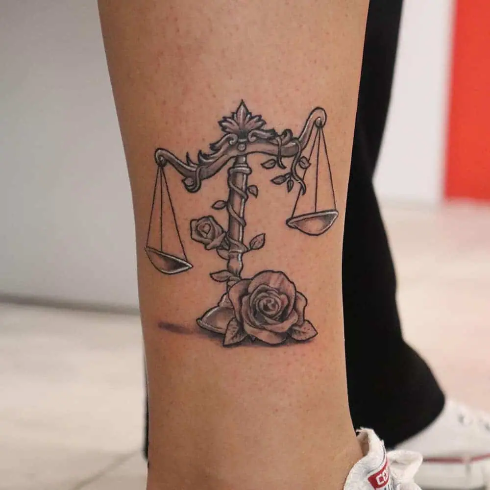 Zodiac sign Libra tattoo on the leg